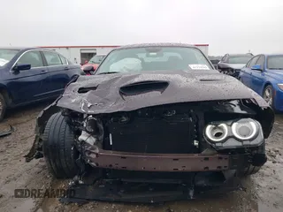 2021 Dodge Challenger R/T Scat Pack z VIN 2C3CDZFJ2MH586535, wystawiony jako IAAI lot #41224949 z przebiegiem 32 977 mil mil oraz . Historia ofert i sprzedaży dostępna na DreamBid. Obrazek 13.