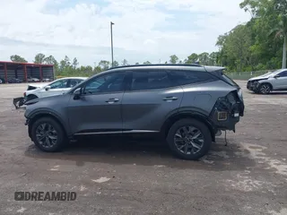 2023 Kia Sportage SX-Prestige with VIN KNDPXCAG7P7071365, listed as a IAAI auction lot 42247639 with 21,509 mi miles and . Bid and sale history available at DreamBid. Image 15.