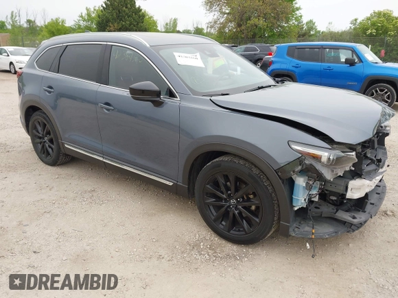 2023 Mazda CX-9 Grand Touring with VIN JM3TCBDY2P0636226, listed as a IAAI auction lot 42384360 with 161,352 mi miles and . Bid and sale history available at DreamBid. Image 1.