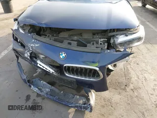 2020 BMW X2 sDrive28i with VIN WBXYH9C02L5P01502, listed as a IAAI auction lot 41397416 with 82,660 mi miles. Bid and sale history available at carsss.com. Image 12.