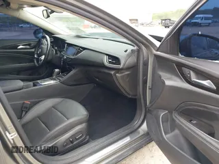 2019 Buick Regal Essence with VIN W04GP6SX6K1009087, listed as a IAAI auction lot 42318056 with 67,460 mi miles and . Bid and sale history available at DreamBid. Image 5.