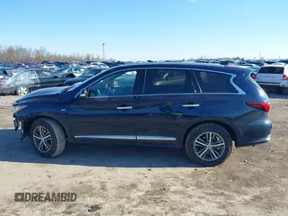 2016 Infiniti QX60 with VIN 5N1AL0MM4GC520196, listed as a IAAI auction lot 41578947 with 90,241 mi miles and . Bid and sale history available at DreamBid. Image 14.