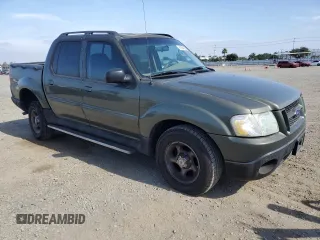 2004 Ford Explorer Sport Trac XLS with VIN 1FMZU67K64UA39174, listed as a Copart auction lot 61035465 with 196,912 mi miles and Salvage title. Bid and sale history available at DreamBid. Image 4.