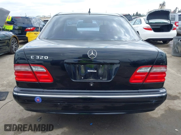 2001 Mercedes-Benz E 320 with VIN WDBJF65J91B363439, listed as a IAAI auction lot 42058536 with 61,272 mi miles and . Bid and sale history available at DreamBid. Image 16.