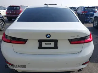 2021 BMW 3 Series 330e with VIN 3MW5P7J00M8C21180, listed as a IAAI auction lot 41451850 with 70,459 mi miles. Bid and sale history available at carsss.com. Image 16.