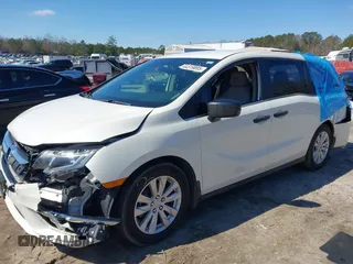 2019 Honda Odyssey LX with VIN 5FNRL6H23KB049236, listed as a IAAI auction lot 41633339 with 96,000 mi miles and . Bid and sale history available at DreamBid. Image 17.