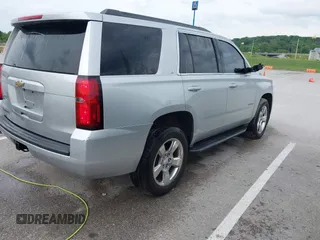 2015 Chevrolet Tahoe LT with VIN 1GNSKBKC3FR224753, listed as a IAAI auction lot 42284497 with 198,943 mi miles and . Bid and sale history available at DreamBid. Image 4.