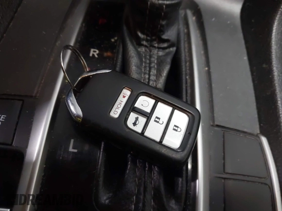 2018 Honda Civic EX-T with VIN JHMFC1F35JX031132, listed as a IAAI auction lot 41591028 with 111,087 mi miles and . Bid and sale history available at DreamBid. Image 11.