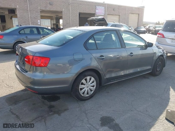 2014 Volkswagen Jetta Sedan S with VIN 3VW2K7AJ1EM290446, listed as a IAAI auction lot 41851440 with 115,291 mi miles. Bid and sale history available at carsss.com. Image 4.