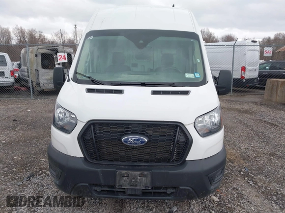 2023 Ford Transit Cargo with VIN 1FTBR3U89PKA07396, listed as a IAAI auction lot 41878907 with 103,402 mi miles and . Bid and sale history available at DreamBid. Image 11.