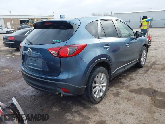 2014 Mazda CX-5 Grand Touring with VIN JM3KE4DYXE0403192, listed as a IAAI auction lot 41828016 with 156,270 mi miles and . Bid and sale history available at carsss.com. Image 4.