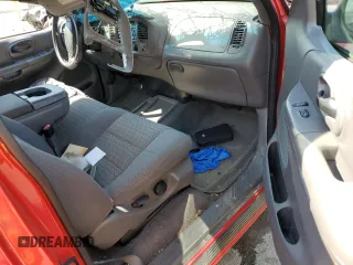 2001 Ford F-150 XL z VIN 2FTRF18W21CA50638, wystawiony jako Copart lot #53474355 z przebiegiem Nie podano mil oraz Nie do naprawy • Non repairable. Historia ofert i sprzedaży dostępna na DreamBid. Obrazek 8.