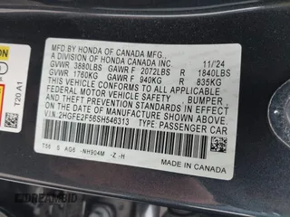 2025 Honda Civic Sport with VIN 2HGFE2F56SH546313, listed as a IAAI auction lot 41889296 with 4,768 mi miles and . Bid and sale history available at DreamBid. Image 9.