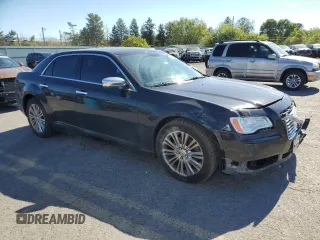 2013 Chrysler 300 C with VIN 2C3CCAKG0DH683117, listed as a Copart auction lot 74812334 with 187,308 mi miles and Salvage Title. Bid and sale history available at DreamBid. Image 4.
