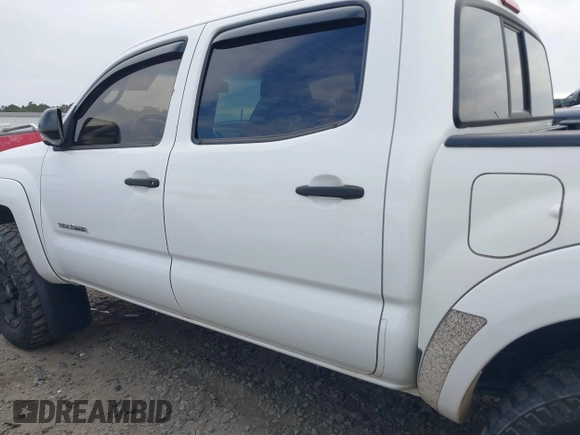 2013 Toyota Tacoma z VIN 5TFLU4EN2DX076815, wystawiony jako IAAI lot #41344839 z przebiegiem 311 083 mil mil oraz . Historia ofert i sprzedaży dostępna na DreamBid. Obrazek 14.