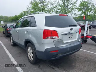 2012 Kia Sorento LX with VIN 5XYKTDA60CG296159, listed as a IAAI auction lot 42197638 with 198,676 mi miles and . Bid and sale history available at carsss.com. Image 3.