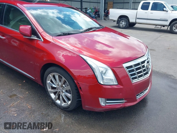 2013 Cadillac XTS Premium with VIN 2G61S5S34D9237236, listed as a IAAI auction lot 41994164 with 218,719 mi miles. Bid and sale history available at carsss.com. Image 6.