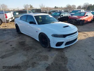 2020 Dodge Charger Scat Pack with VIN 2C3CDXGJ1LH217683, listed as a IAAI auction lot 41656722 with 70,758 mi miles. Bid and sale history available at carsss.com. Image 1.