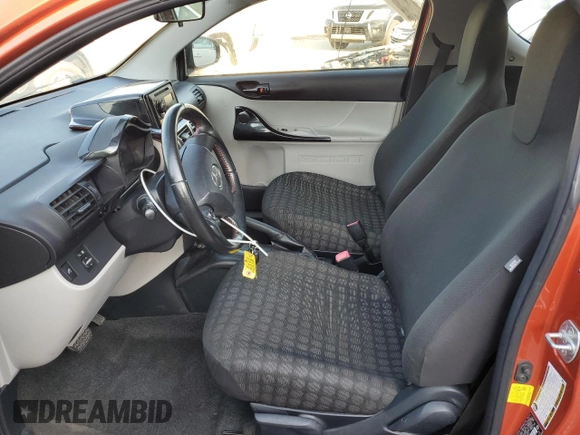2012 Scion iQ z VIN JTNJJXB0XCJ020404, wystawiony jako Copart lot #62157565 z przebiegiem 82 869 mil mil oraz Nie do naprawy • Non repairable. Historia ofert i sprzedaży dostępna na DreamBid. Obrazek 7.