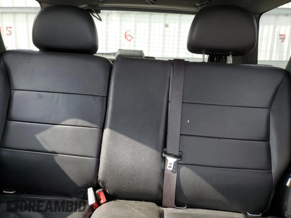 2011 Ford Escape Limited z VIN 1FMCU0E77BKA37976, wystawiony jako Copart lot #50186145 z przebiegiem Nie podano mil oraz Szkoda całkowita • Salvage title. Historia ofert i sprzedaży dostępna na DreamBid. Obrazek 10.