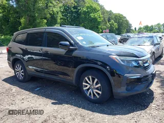 2019 Honda Pilot EX-L with VIN 5FNYF6H52KB006469, listed as a IAAI auction lot 42103135 with 12,757 mi miles and . Bid and sale history available at DreamBid. Image 13.