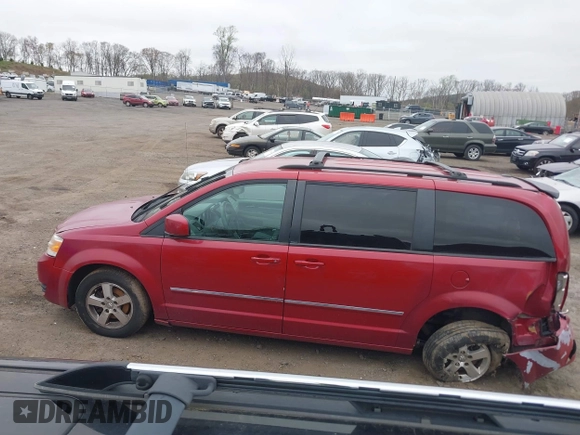 2009 Dodge Grand Caravan SXT z VIN 2D8HN54X69R593635, wystawiony jako IAAI lot #39235325 z przebiegiem 207 996 mil mil oraz . Historia ofert i sprzedaży dostępna na DreamBid. Obrazek 14.