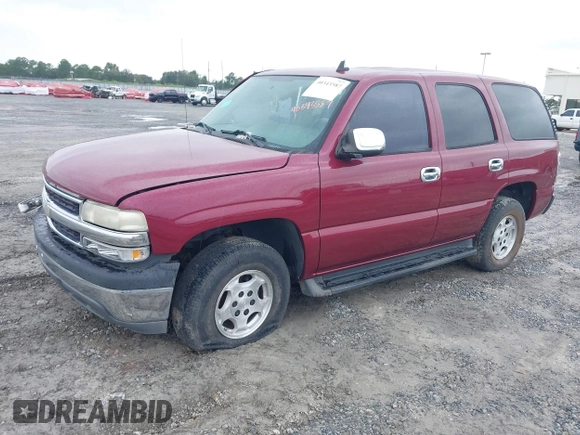 2006 Chevrolet Tahoe LS with VIN 1GNEC13V76R102143, listed as a IAAI auction lot 40343587 with 220,952 mi miles. Bid and sale history available at carsss.com. Image 2.