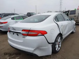 2015 Jaguar XF V6 Portfolio with VIN SAJWJ0FF2F8U59934, listed as a IAAI auction lot 41558305 with 120,219 mi miles. Bid and sale history available at carsss.com. Image 4.