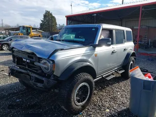 2022 Ford Bronco with VIN 1FMEE5DP5NLB85773, listed as a IAAI auction lot 41184225 with 22,597 mi miles. Bid and sale history available at carsss.com. Image 2.