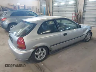 1998 Honda Civic DX with VIN 2HGEJ6342WH101132, listed as a IAAI auction lot 41253094 with 179,169 mi miles. Bid and sale history available at carsss.com. Image 4.
