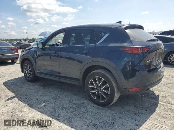 2018 Mazda CX-5 Grand Touring with VIN JM3KFADM1J1387297, listed as a Copart auction lot 60589625 with 92,283 mi miles and Non repairable. Bid and sale history available at DreamBid. Image 2.