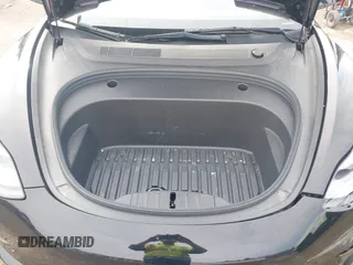 2022 Tesla Model 3 Long Range with VIN 5YJ3E1EBXNF177128, listed as a IAAI auction lot 41966089 with 75,140 mi miles and . Bid and sale history available at DreamBid. Image 10.