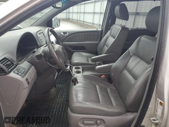 2008 Honda Odyssey EX-L z VIN 5FNRL38778B095946, wystawiony jako Copart lot #54676585 z przebiegiem 213 337 mil mil oraz Czysty tytuł • Clean title. Historia ofert i sprzedaży dostępna na DreamBid. Obrazek 7.