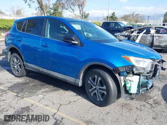 2018 Toyota RAV4 LE with VIN 2T3ZFREV9JW442691, listed as a IAAI auction lot 41946423 with 133,856 mi miles. Bid and sale history available at carsss.com. Image 1.