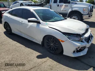 2020 Honda Civic Si with VIN 2HGFC1E52LH704407, listed as a Copart auction lot 54919985 with 44,521 mi miles and Salvage Title. Bid and sale history available at DreamBid. Image 4.