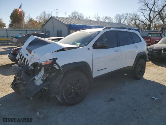 2018 Jeep Cherokee Trailhawk with VIN 1C4PJMBB1JD549783, listed as a Copart auction lot 77056883 with 84,404 mi miles and Non Repairable. Bid and sale history available at carsss.com. Image 1.