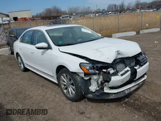 2012 Volkswagen Passat SEL with VIN 1VWCP7A30CC090499, listed as a IAAI auction lot 42037393 with 174,582 mi miles. Bid and sale history available at carsss.com. Image 1.
