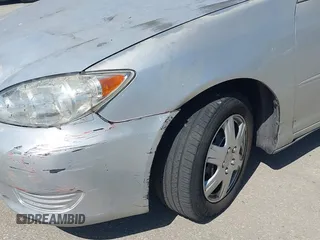 2006 Toyota Camry STD z VIN 4T1BE32K66U160455, wystawiony jako IAAI lot #41825645 z przebiegiem 195 926 mil mil oraz . Historia ofert i sprzedaży dostępna na DreamBid. Obrazek 6.