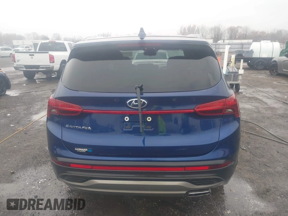 2022 Hyundai Santa Fe SE z VIN 5NMS14AJ8NH406846, wystawiony jako IAAI lot #41588202 z przebiegiem 34 006 mil mil oraz . Historia ofert i sprzedaży dostępna na DreamBid. Obrazek 16.