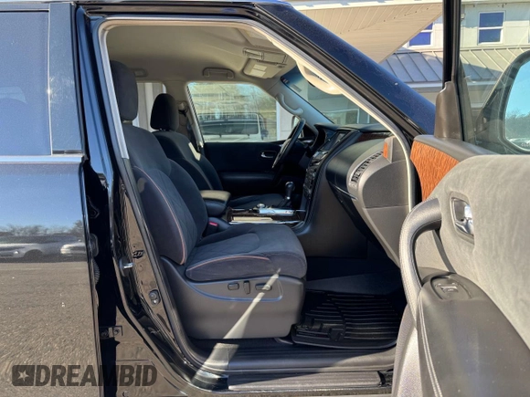2017 Nissan Armada SV z VIN JN8AY2NC1H9504189, wystawiony jako Copart lot #58663705 z przebiegiem 203 864 mil mil oraz Czysty tytuł • Clean title. Historia ofert i sprzedaży dostępna na DreamBid. Obrazek 5.