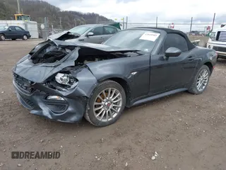 2017 FIAT 124 Spider Lusso z VIN JC1NFAEK7H0106877, wystawiony jako IAAI lot #42049505 z przebiegiem 54 487 mil mil oraz . Historia ofert i sprzedaży dostępna na DreamBid. Obrazek 2.