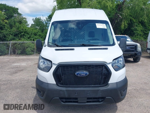 2022 Ford Transit Cargo with VIN 1FTBR3X89NKA23915, listed as a IAAI auction lot 42233534 with 3,755 mi miles and . Bid and sale history available at DreamBid. Image 12.