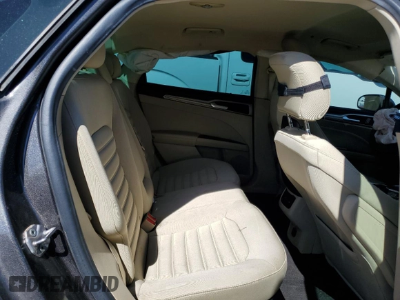 2016 Ford Fusion SE Hybrid with VIN 3FA6P0LU3GR307666, listed as a Copart auction lot 57444365 with 127,786 mi miles and Salvage title. Bid and sale history available at DreamBid. Image 10.