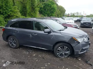 2020 Acura MDX Technology z VIN 5J8YD4H59LL033422, wystawiony jako IAAI lot #42268371 z przebiegiem 42 670 mil mil oraz . Historia ofert i sprzedaży dostępna na DreamBid. Obrazek 13.