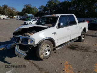 2002 Ford F-150 XLT with VIN 1FTRW07L42KB90527, listed as a Copart auction lot 85098244 with 143,213 mi miles and Salvage Title. Bid and sale history available at carsss.com. Image 1.
