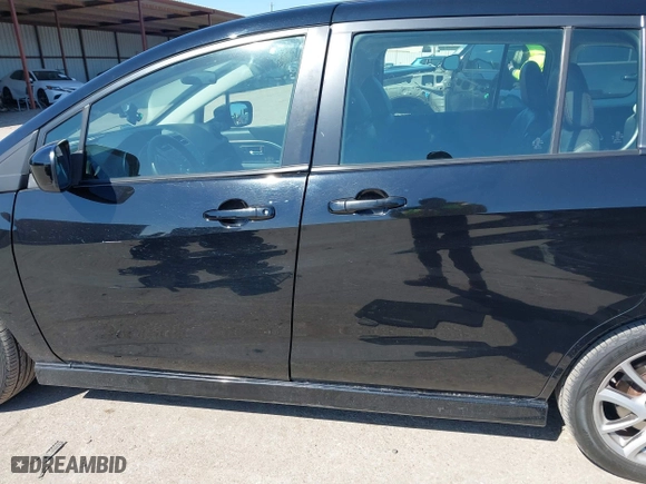2012 Mazda Mazda5 Grand Touring with VIN JM1CW2DLXC0138533, listed as a IAAI auction lot 41609270 with 263,625 mi miles. Bid and sale history available at carsss.com. Image 14.