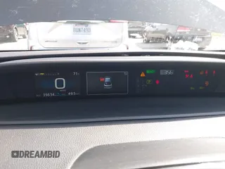 2021 Toyota Prius L Eco with VIN JTDKAMFU8M3136565, listed as a IAAI auction lot 42161896 with 39,634 mi miles and . Bid and sale history available at DreamBid. Image 7.