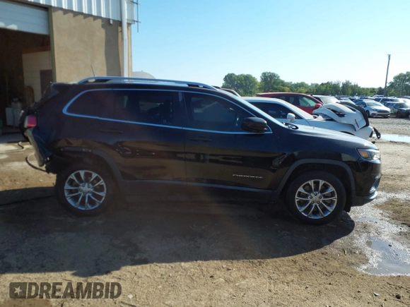 2019 Jeep Cherokee Latitude Plus with VIN 1C4PJLLB3KD223431, listed as a IAAI auction lot 40377530 with 123,575 mi miles. Bid and sale history available at carsss.com. Image 13.