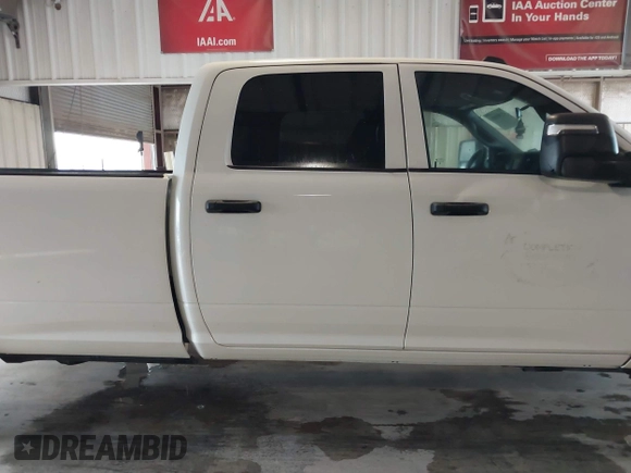2023 Ram 2500 Tradesman z VIN 3C6UR5HJ0PG610057, wystawiony jako IAAI lot #42385008 z przebiegiem 21 105 mil mil oraz . Historia ofert i sprzedaży dostępna na DreamBid. Obrazek 13.
