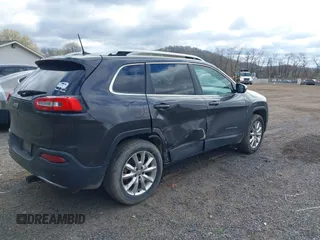 2016 Jeep Cherokee Limited with VIN 1C4PJMDB8GW309110, listed as a IAAI auction lot 41990343 with 163,054 mi miles. Bid and sale history available at carsss.com. Image 4.